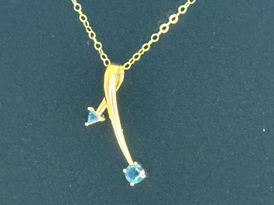 A very chic Pendant with 2 sapphires and 14K gold