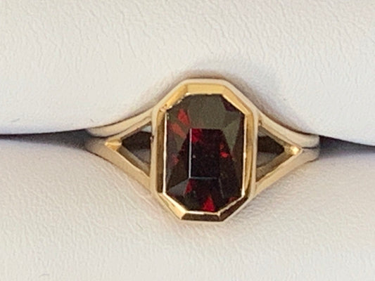 Simple Garnet and Gold Ring